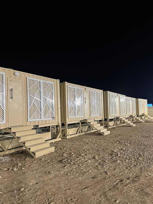 Advance Cabin unit fleet at an event site at night