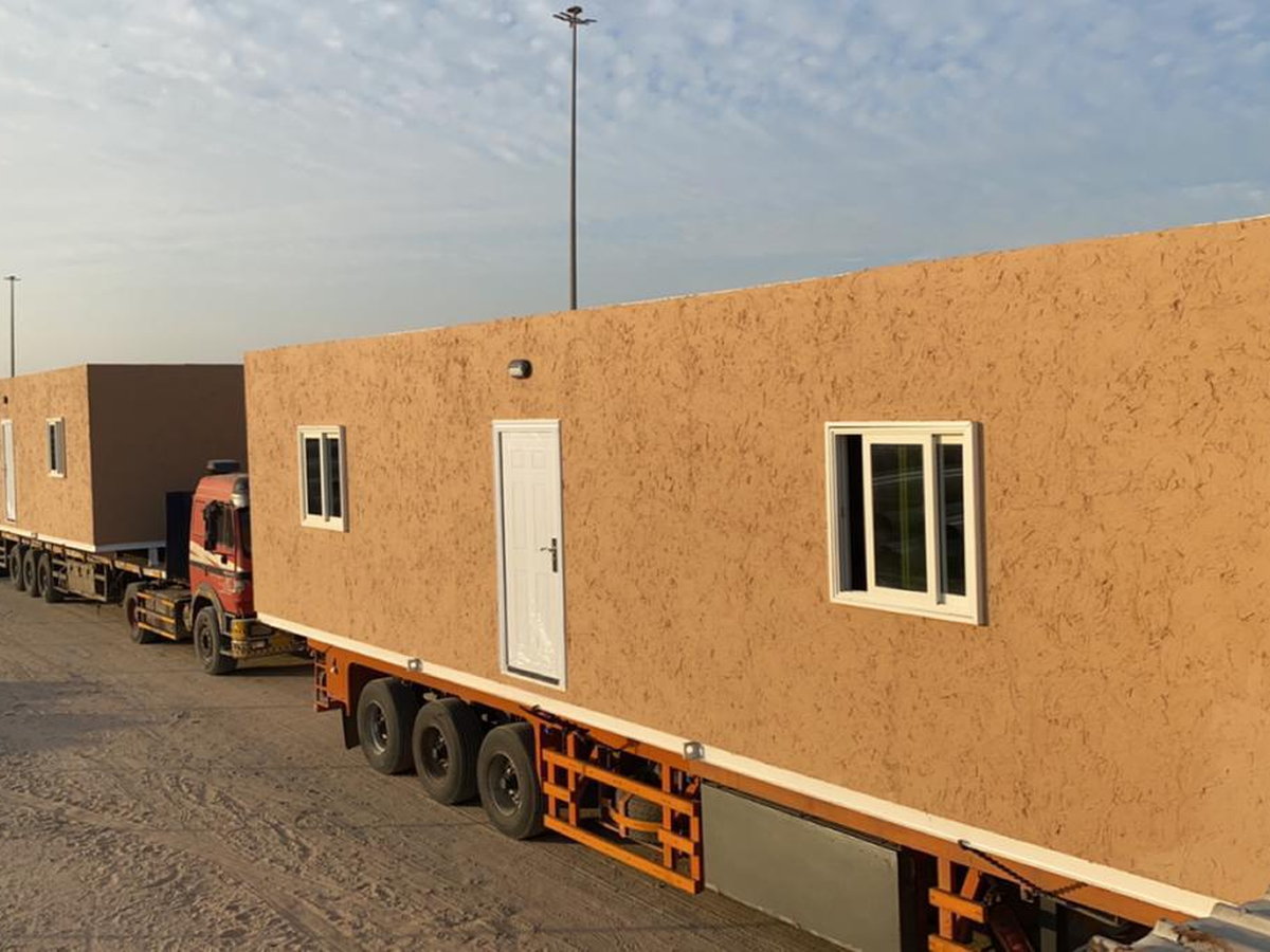 Transporting a temporary building to site