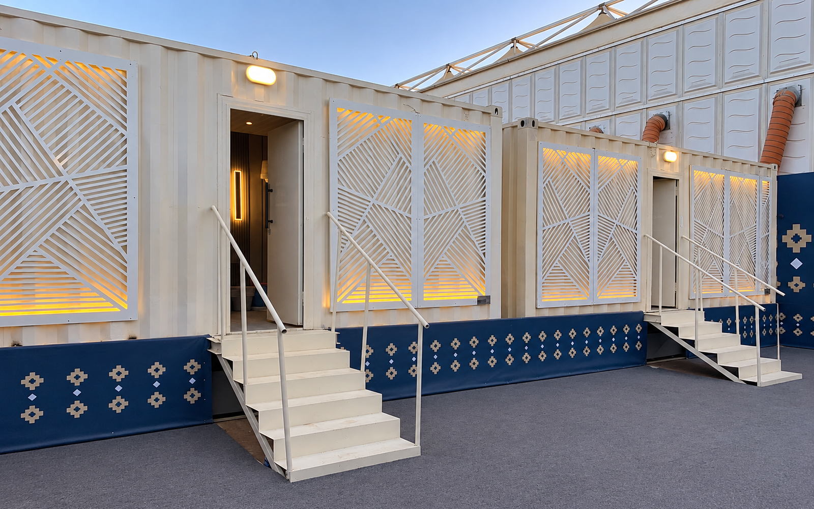 Portable toilet rental — unit with laser-cut screen facade and integrated waste tank